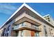 Modern building exterior with brick facade and balconies at 4200 W 17Th Ave # 235, Denver, CO 80204