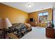 Charming bedroom with a double bed and wood furniture at 5175 Mining Camp Trl, Parker, CO 80134