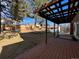 Large backyard with deck, pergola, and shed at 1754 S Troy St, Aurora, CO 80012