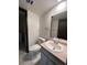Clean bathroom with updated vanity and toilet at 1754 S Troy St, Aurora, CO 80012