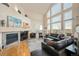 Spacious living room with vaulted ceilings and a fireplace at 8106 S Albion St, Centennial, CO 80122