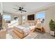 Bright main bedroom with ceiling fan and large windows at 10700 Kimblewyck Cir # 147, Northglenn, CO 80233