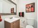 Clean bathroom with updated vanity and toilet at 12288 E Louisiana Dr, Aurora, CO 80012