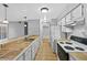 Kitchen with white cabinets and appliances at 4899 S Dudley St # 7H, Littleton, CO 80123