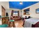 Cozy basement bedroom with wood floors, and a view at 12154 Mesa View Rd, Larkspur, CO 80118