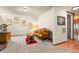 Basement area with leather couch and western-themed decor at 12154 Mesa View Rd, Larkspur, CO 80118