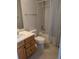 Full bathroom with tub, toilet and wood vanity at 12756 E Harvard Cir, Aurora, CO 80014