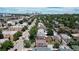 Aerial view of a city neighborhood with houses and a main road at 638 S Lincoln St, Denver, CO 80209