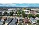 Aerial view showing houses, streets, and distant mountains at 638 S Lincoln St, Denver, CO 80209