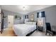 Comfortable bedroom with a queen bed and private closet at 638 S Lincoln St, Denver, CO 80209
