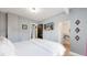 Bright bedroom with a queen-size bed and private closet at 638 S Lincoln St, Denver, CO 80209