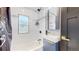 Bathroom with a bathtub, shower, and modern vanity at 638 S Lincoln St, Denver, CO 80209