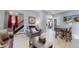 Living room with a fireplace, dining area and staircase at 638 S Lincoln St, Denver, CO 80209