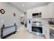 Modern kitchen with white cabinets and stainless steel appliances at 638 S Lincoln St, Denver, CO 80209
