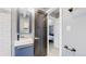Clean bathroom with a sink and access to a bedroom at 638 S Lincoln St, Denver, CO 80209
