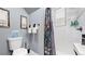 Clean bathroom with a shower/tub combo and modern vanity at 638 S Lincoln St, Denver, CO 80209