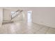 Bright entryway with tile flooring and staircase leading to the upper level at 14543 E 12Th Ave, Aurora, CO 80011