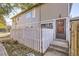 House exterior with white picket fence and steps leading to the entrance at 14543 E 12Th Ave, Aurora, CO 80011