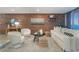 Living room with exposed brick wall and modern decor at 955 Eudora St # 1008, Denver, CO 80220