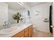 Clean bathroom with double vanity and neutral color scheme at 4340 Nelson Dr, Broomfield, CO 80023