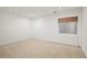 Bright and airy basement bedroom with neutral wall paint and carpeting at 4340 Nelson Dr, Broomfield, CO 80023