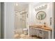 Basement bathroom with a shower/tub combo, vanity, and updated fixtures at 4340 Nelson Dr, Broomfield, CO 80023
