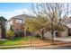 Brick home with two-car garage and landscaping at 4340 Nelson Dr, Broomfield, CO 80023