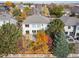 Aerial view of house showcasing its backyard and autumn foliage at 4340 Nelson Dr, Broomfield, CO 80023