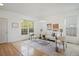 Spacious living room with hardwood floors and large windows at 4340 Nelson Dr, Broomfield, CO 80023