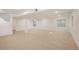 Spacious finished basement with neutral carpet and large windows at 4340 Nelson Dr, Broomfield, CO 80023