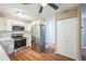 Updated kitchen featuring stainless steel appliances and light wood cabinets at 9180 E Center Ave # 1A, Denver, CO 80247