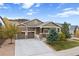 Spacious ranch home with a two-car garage and well-maintained landscaping at 4763 Gould Cir, Castle Rock, CO 80109