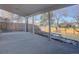 Covered patio overlooking fenced backyard at 7168 S Cody Way, Littleton, CO 80128