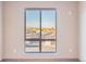 View from a window showing a parking lot and autumn trees at 12983 W Ida Ave # 302, Littleton, CO 80127