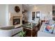 Living room with fireplace and comfortable seating at 7600 Landmark Way # 1215, Greenwood Village, CO 80111