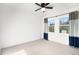 Spacious bedroom with two large windows and neutral colored carpet at 6 Yellow Flax, Littleton, CO 80127