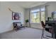 Home office featuring a comfortable chair and large window at 2765 S Lincoln St, Englewood, CO 80113