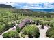 Luxury home nestled in the mountains with a circular driveway at 2916 Hiwall Ct, Castle Rock, CO 80109