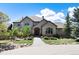 Two-story home with landscaping and a welcoming front entrance at 2916 Hiwall Ct, Castle Rock, CO 80109