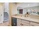 Kitchen with a view into the living room and stainless steel appliances at 2901 W Long Dr # G, Littleton, CO 80120