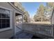 Private patio with wood fence and green space at 2901 W Long Dr # G, Littleton, CO 80120