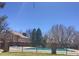 Community pool with brick fence and surrounding landscaping at 2901 W Long Dr # G, Littleton, CO 80120