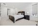 Spacious bedroom with plush carpeting and large windows at 3010 Newfound Lake Rd, Berthoud, CO 80513