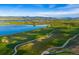 Community landscape with lake and golf course at 3010 Newfound Lake Rd, Berthoud, CO 80513