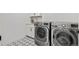 Convenient laundry room with modern washer and dryer at 3010 Newfound Lake Rd, Berthoud, CO 80513