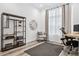 Home office featuring a standing desk and large window at 3010 Newfound Lake Rd, Berthoud, CO 80513