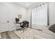 Well-lit home office with ample space for work and relaxation at 3010 Newfound Lake Rd, Berthoud, CO 80513
