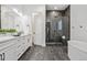 Spa-like bathroom with a large shower and double vanity at 3010 Newfound Lake Rd, Berthoud, CO 80513