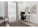 Bright and airy home office with built-in shelving at 3010 Newfound Lake Rd, Berthoud, CO 80513