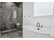 Elegant bathroom with a walk-in shower and freestanding tub at 3010 Newfound Lake Rd, Berthoud, CO 80513
